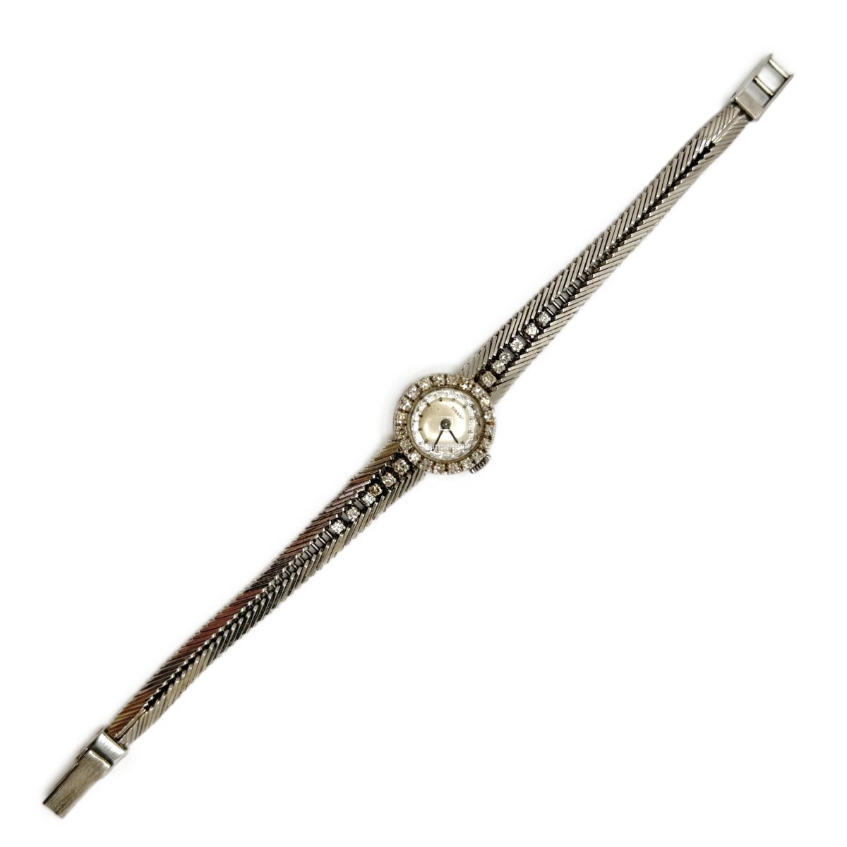 Montre TISSOT en or blanc et diamants - Castafiore