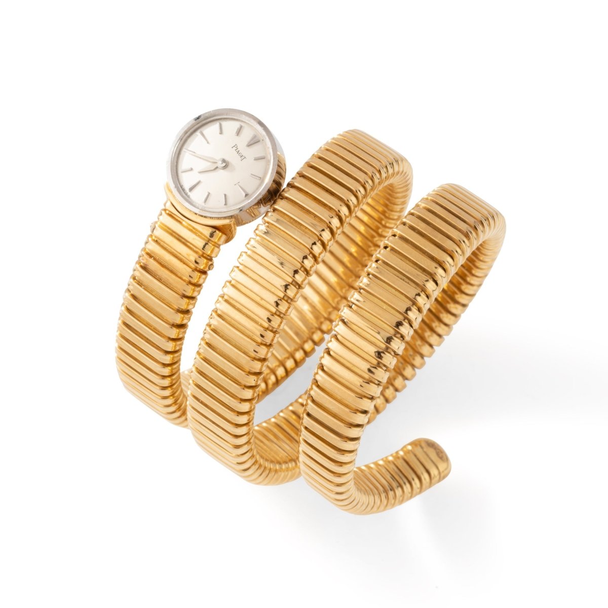 Montre Tubogas PIAGET en or jaune et or blanc - Castafiore