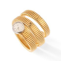 Montre Tubogas PIAGET en or jaune et or blanc - Castafiore