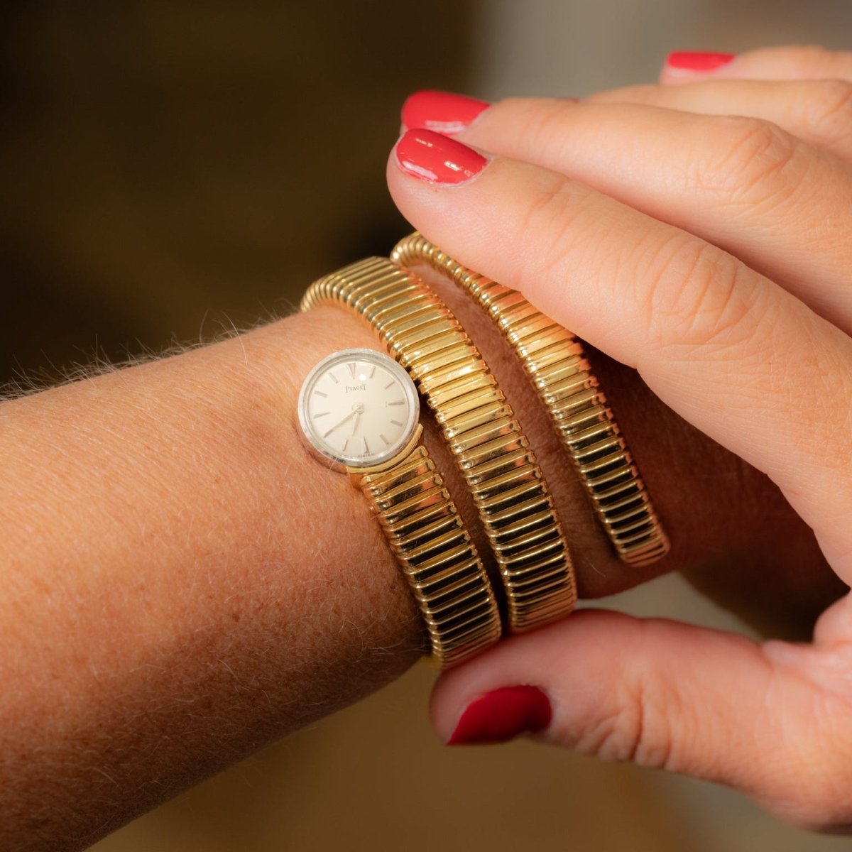 Montre Tubogas PIAGET en or jaune et or blanc - Castafiore