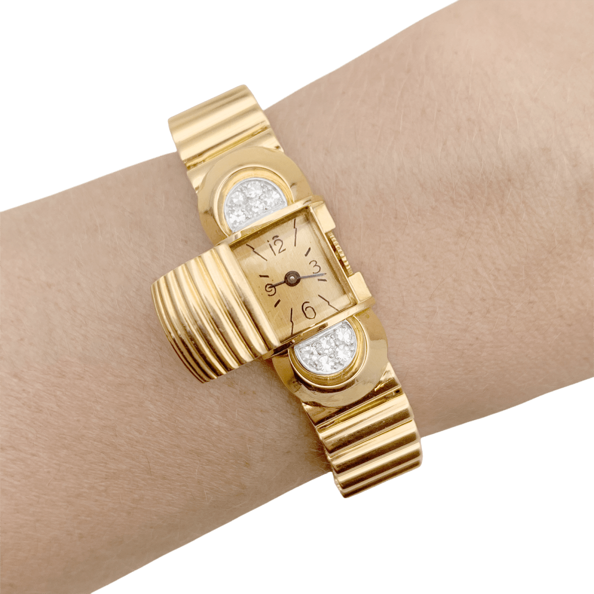 Montre UTI en or jaune, or blanc et diamants - Castafiore