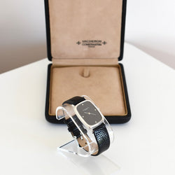 Montre VACHERON CONSTANTIN en or blanc, acier, cuir, onyx et diamants - Castafiore