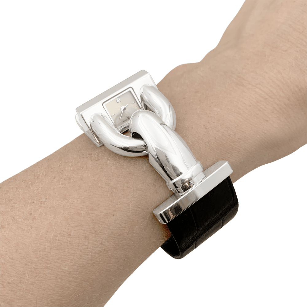 Montre VAN CLEEF & ARPELS "Cadenas" en acier et cuir - Castafiore