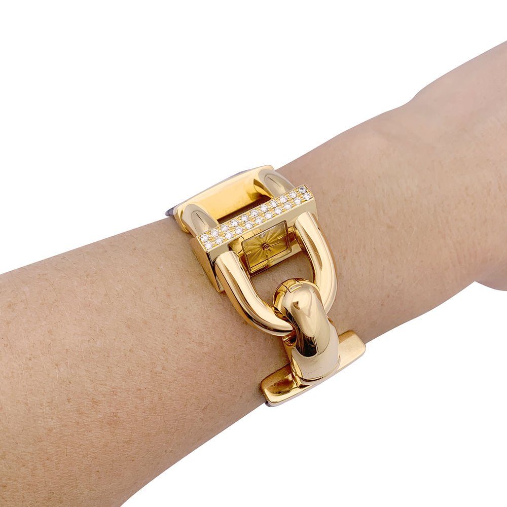 Montre Van Cleef & Arpels "Cadenas" or jaune, diamants, cuir. - Castafiore