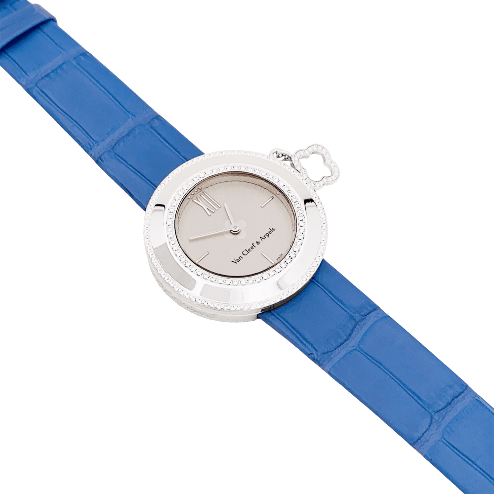 Montre VAN CLEEF & ARPELS "Charms" en or blanc, cuir et diamants - Castafiore
