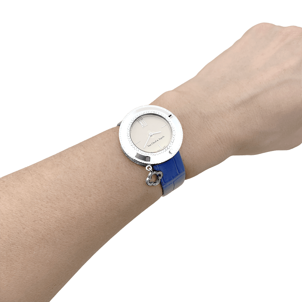 Montre VAN CLEEF & ARPELS "Charms" en or blanc, cuir et diamants - Castafiore