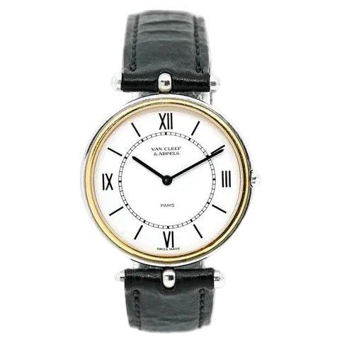 Montre VAN CLEEF & ARPELS "PA 49" en or jaune, acier et cuir - Castafiore