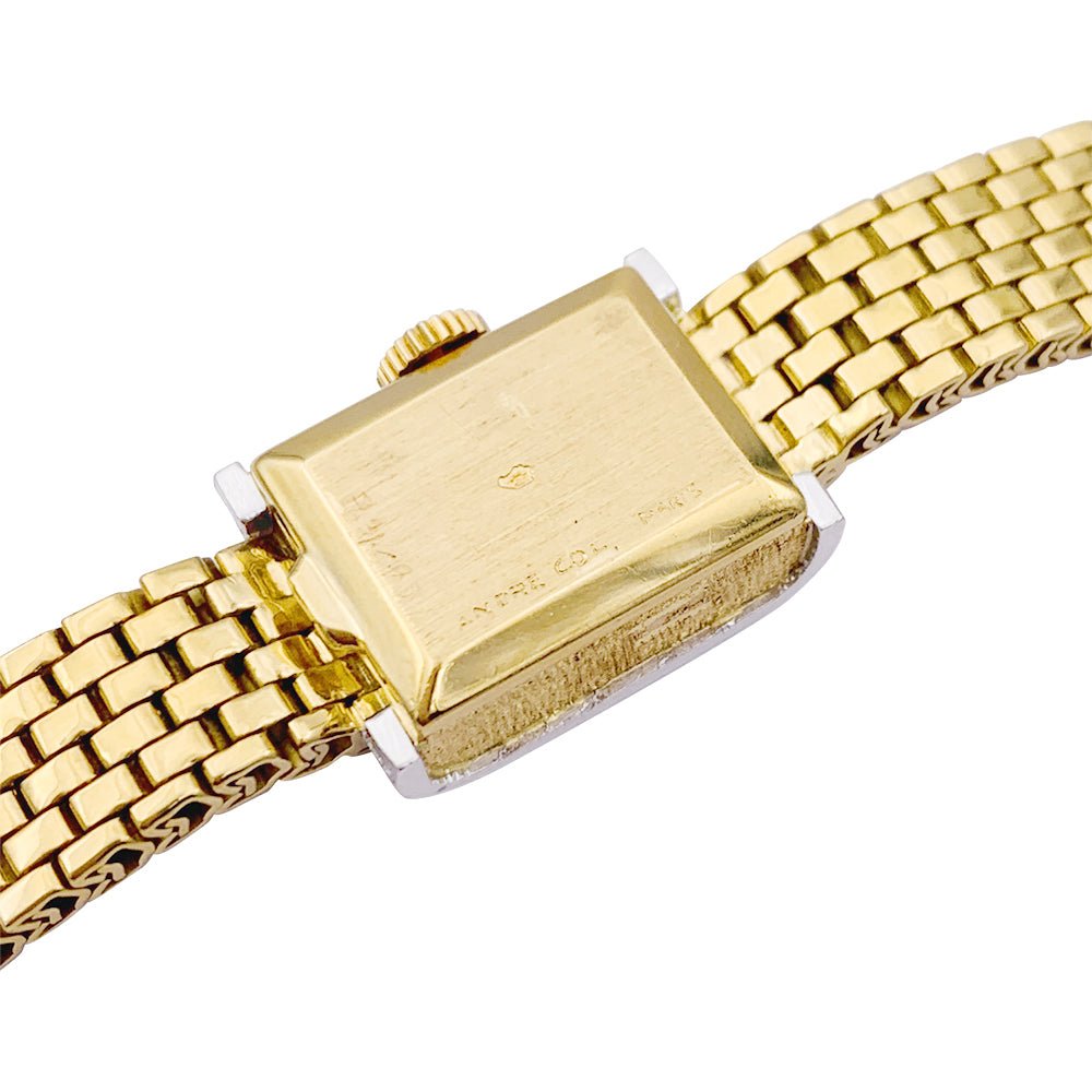 Montre vintage André Col, or jaune, platine, diamants. - Castafiore