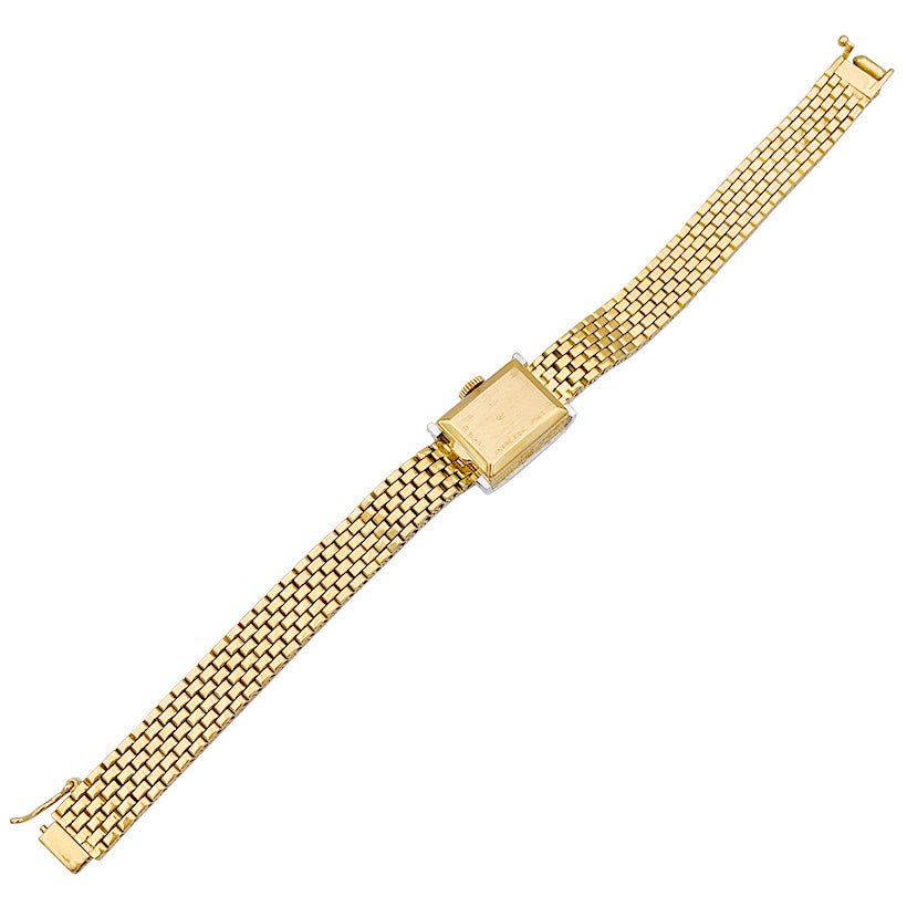 Montre vintage André Col, or jaune, platine, diamants. - Castafiore