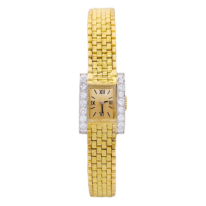 Montre vintage André Col, or jaune, platine, diamants. - Castafiore