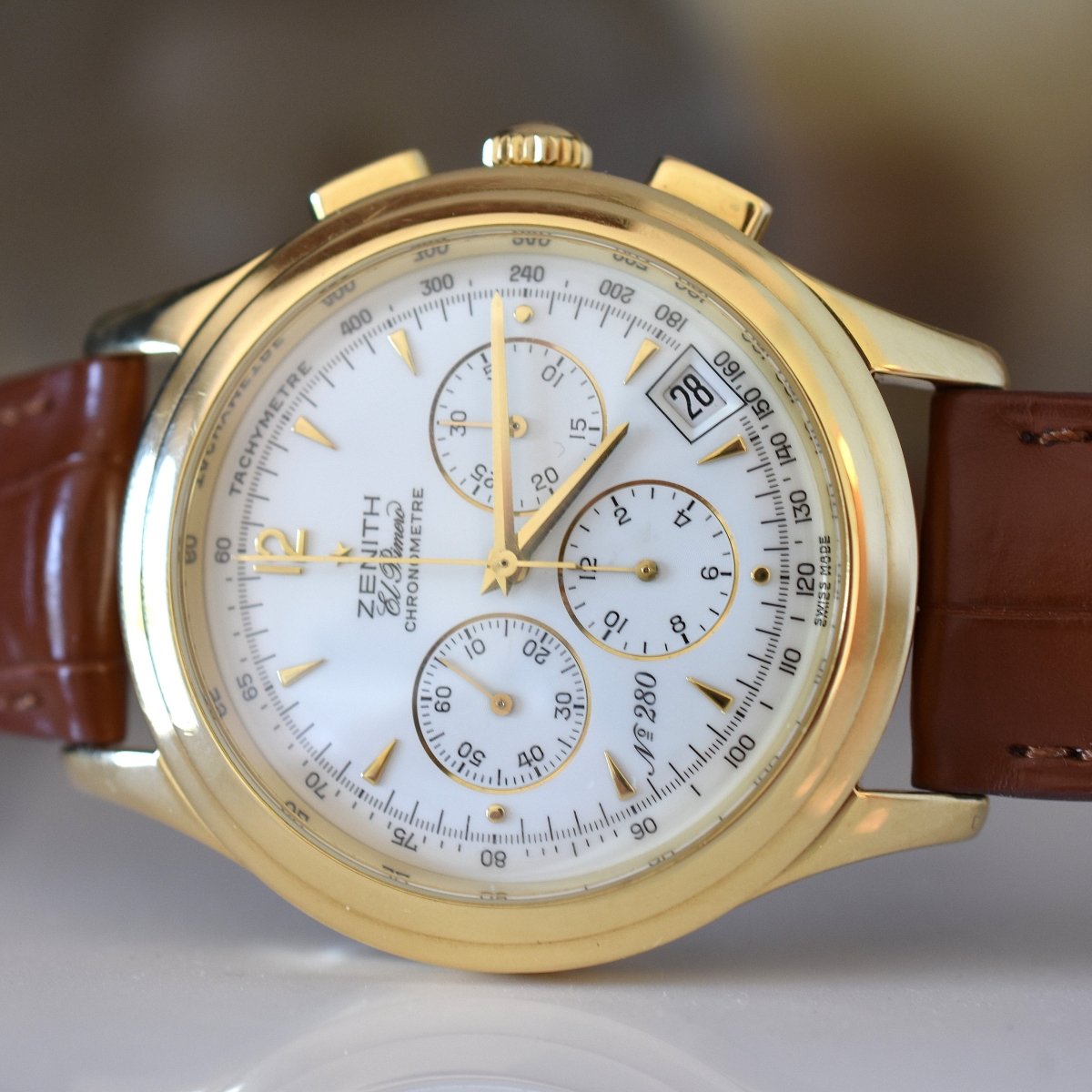Montre ZENITH "El Primero" en or jaune et cuir - Castafiore