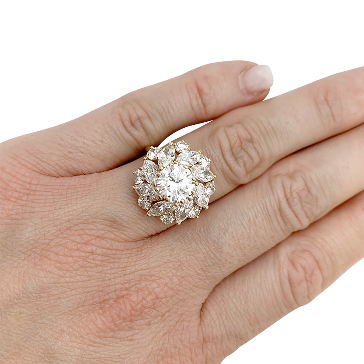 Bague Cartier, "Marguerite", diamants central 1,57 carat, or jaune.