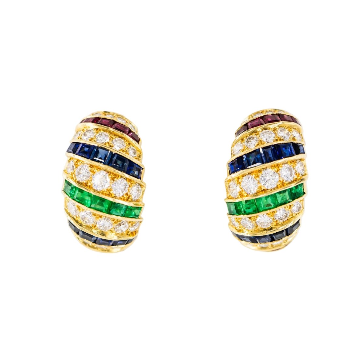 Parure CARTIER en or jaune, saphirs, émeraudes, rubis et diamants - Castafiore