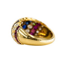 Parure CARTIER en or jaune, saphirs, émeraudes, rubis et diamants - Castafiore