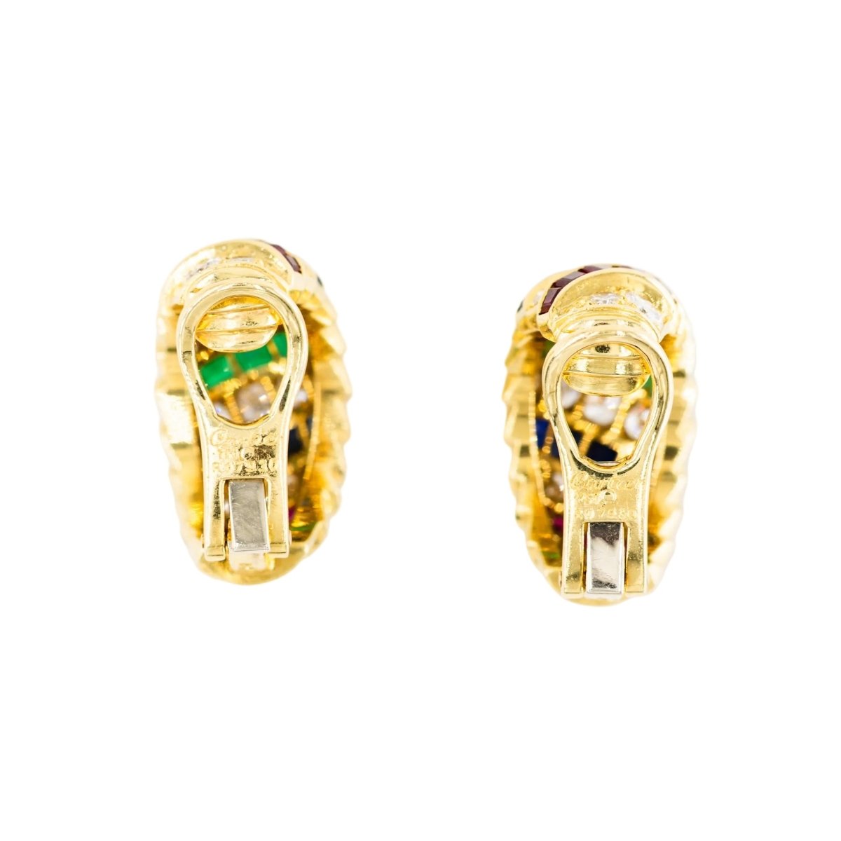 Parure CARTIER en or jaune, saphirs, émeraudes, rubis et diamants - Castafiore