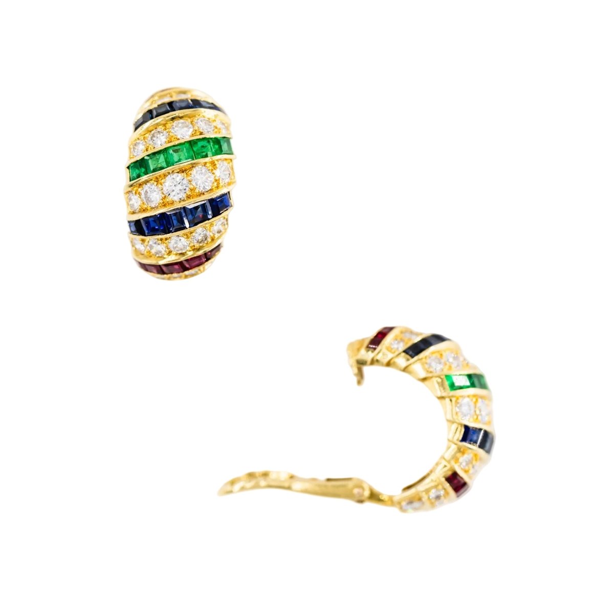 Parure CARTIER en or jaune, saphirs, émeraudes, rubis et diamants - Castafiore
