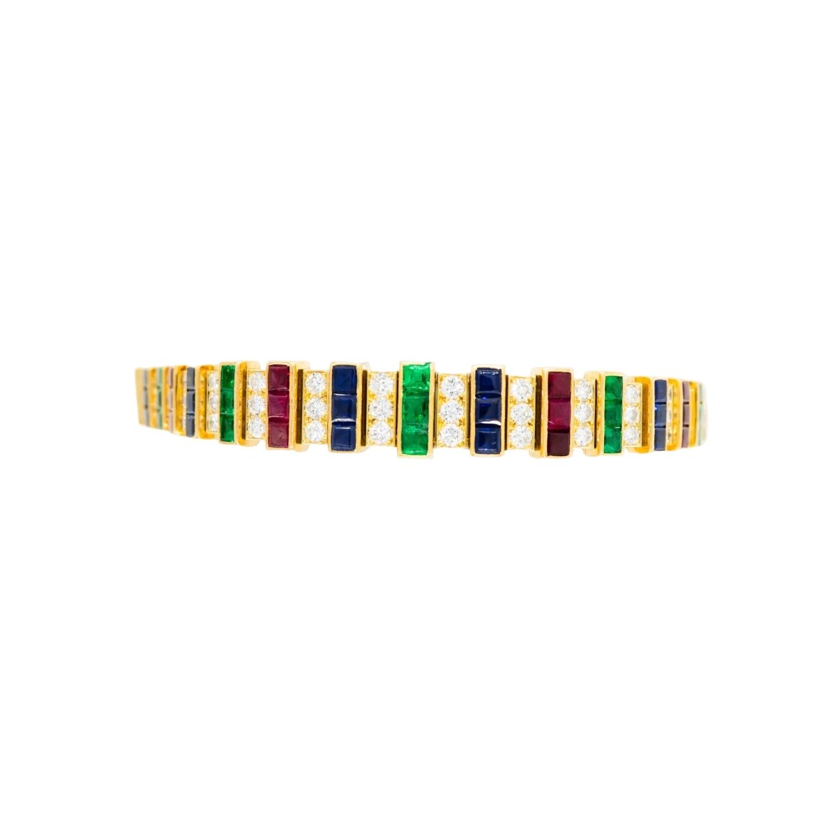 Parure CARTIER en or jaune, saphirs, émeraudes, rubis et diamants - Castafiore