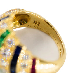 Parure CARTIER en or jaune, saphirs, émeraudes, rubis et diamants - Castafiore