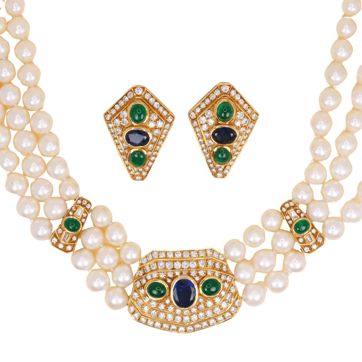 Parure REPOSSI en or jaune, perles, saphirs, émeraudes et diamants - Castafiore