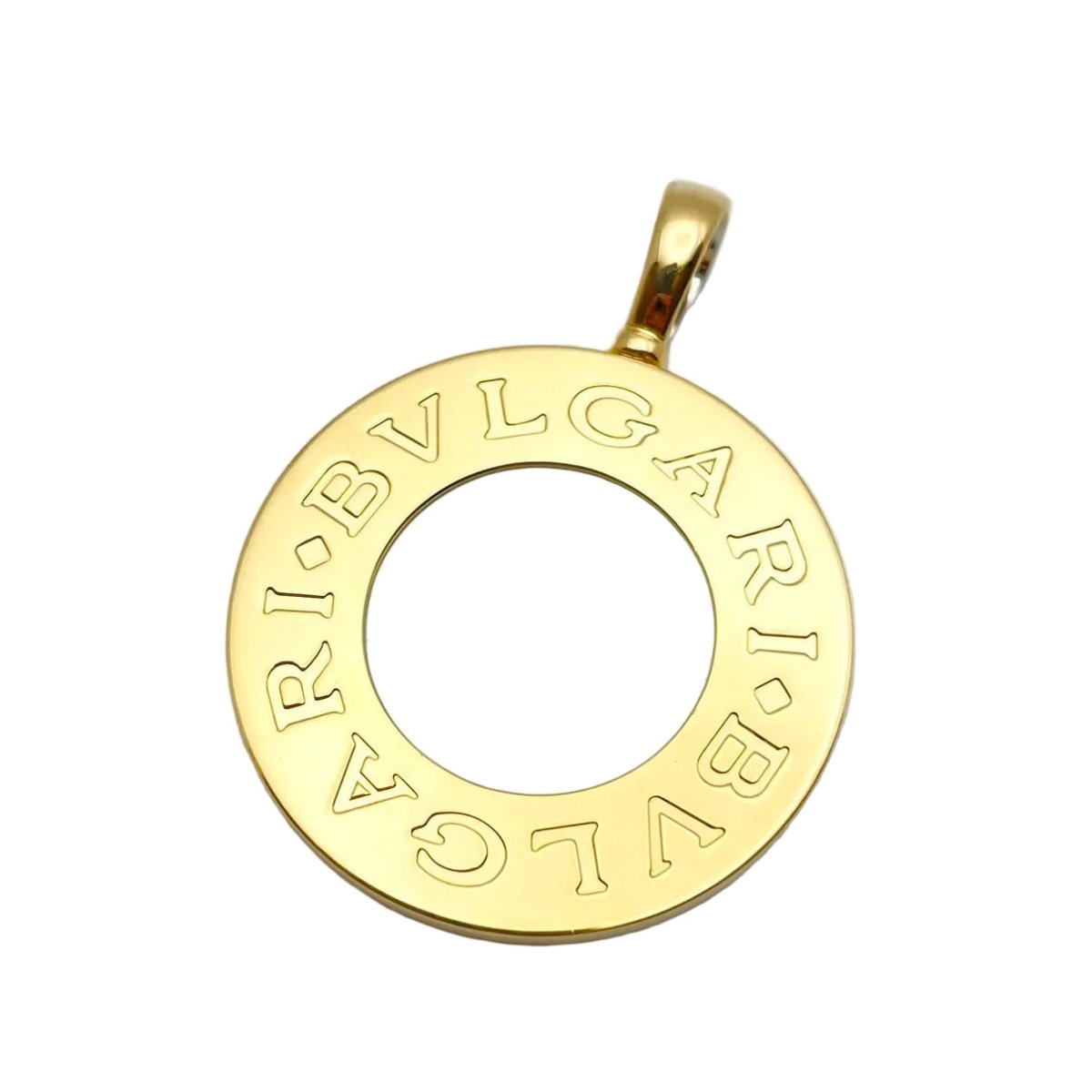 Pendentif BULGARI en or blanc, or jaune, nacre et onyx - Castafiore