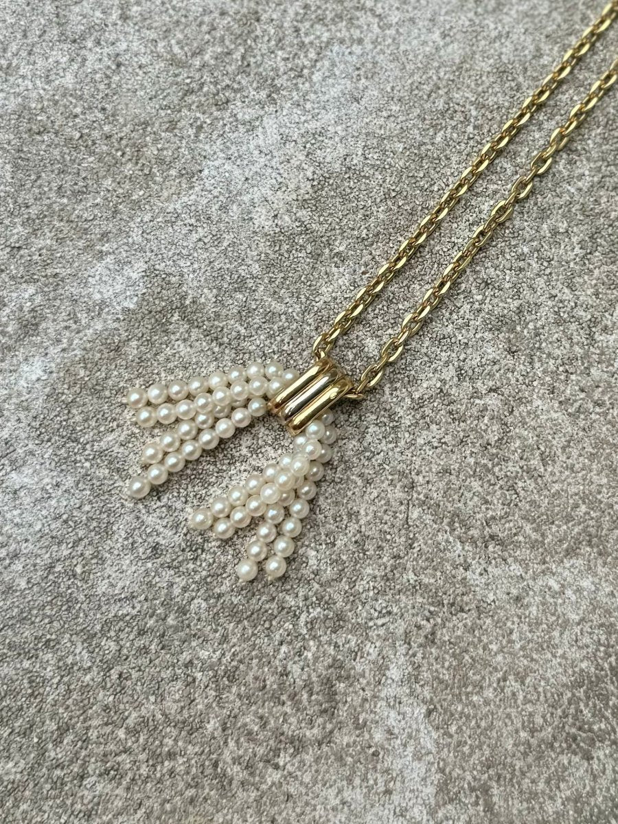Pendentif CARTIER pompon en or jaune, or blanc, or rose et perles - Castafiore