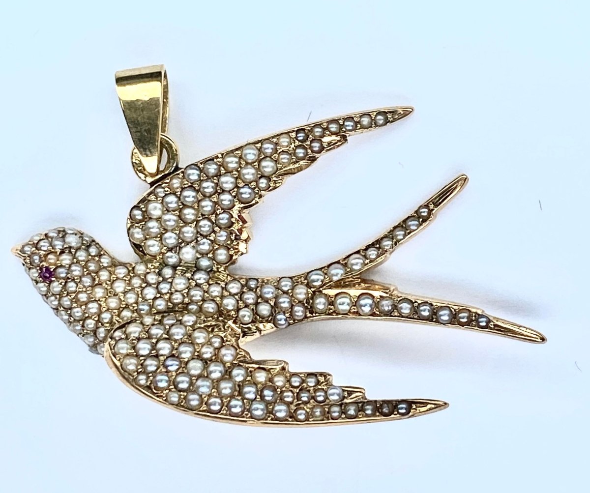 Pendentif en or 18 carats : hirondelle en perles fines et rubis - Castafiore