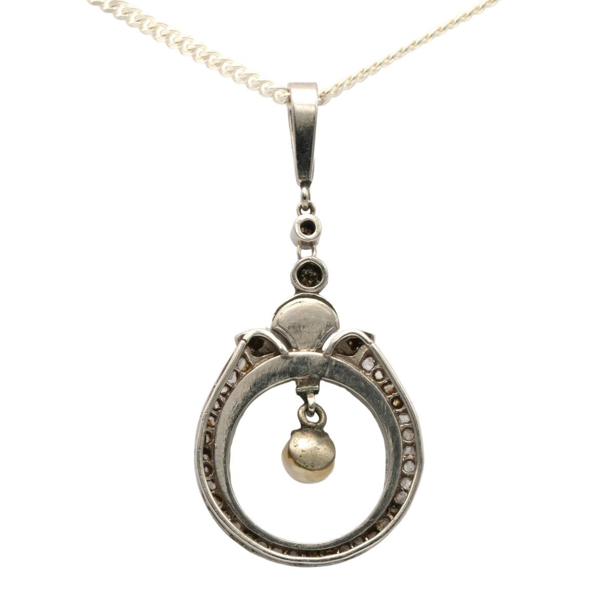 Pendentif en or blanc, onyx, perle et diamants - Castafiore