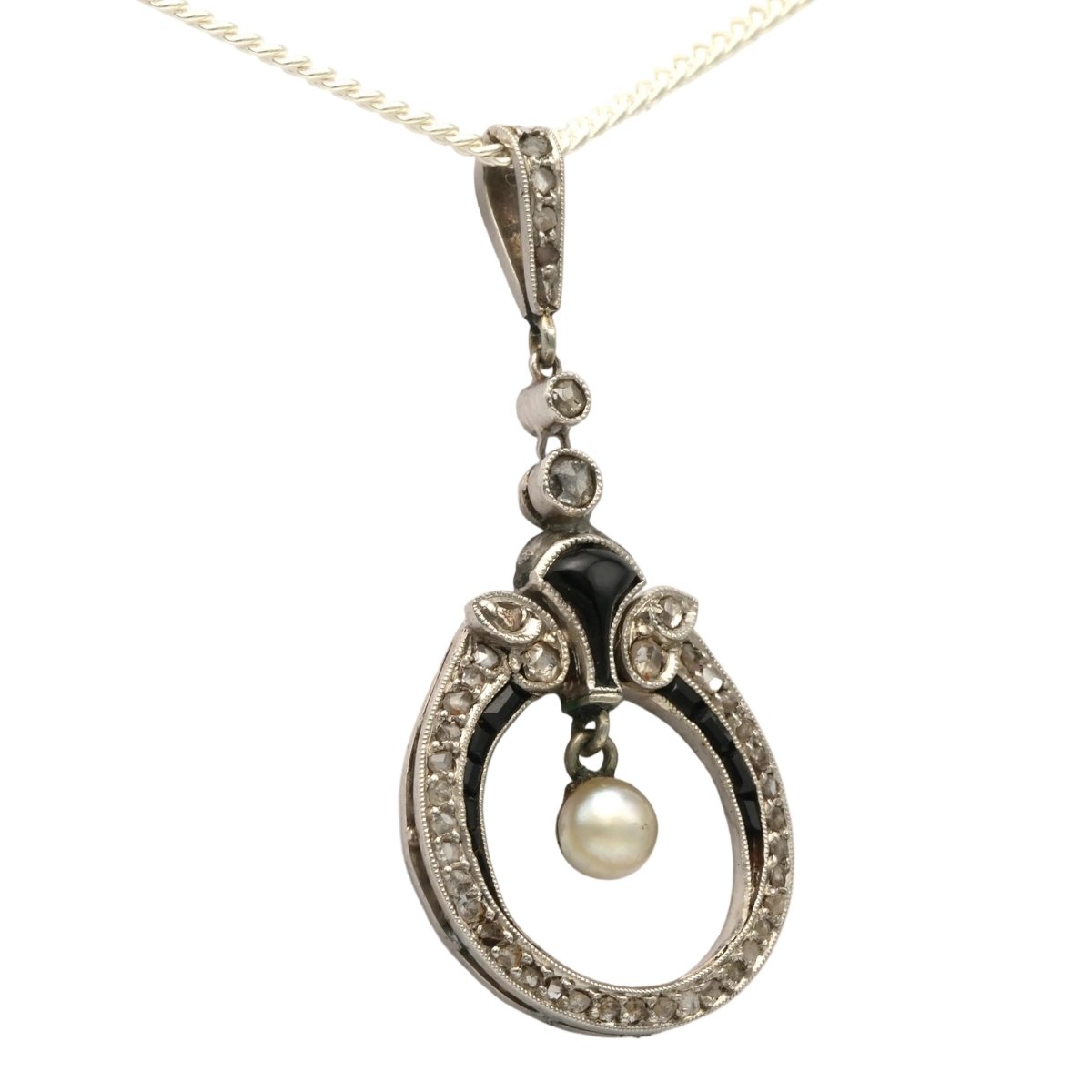 Pendentif en or blanc, onyx, perle et diamants - Castafiore