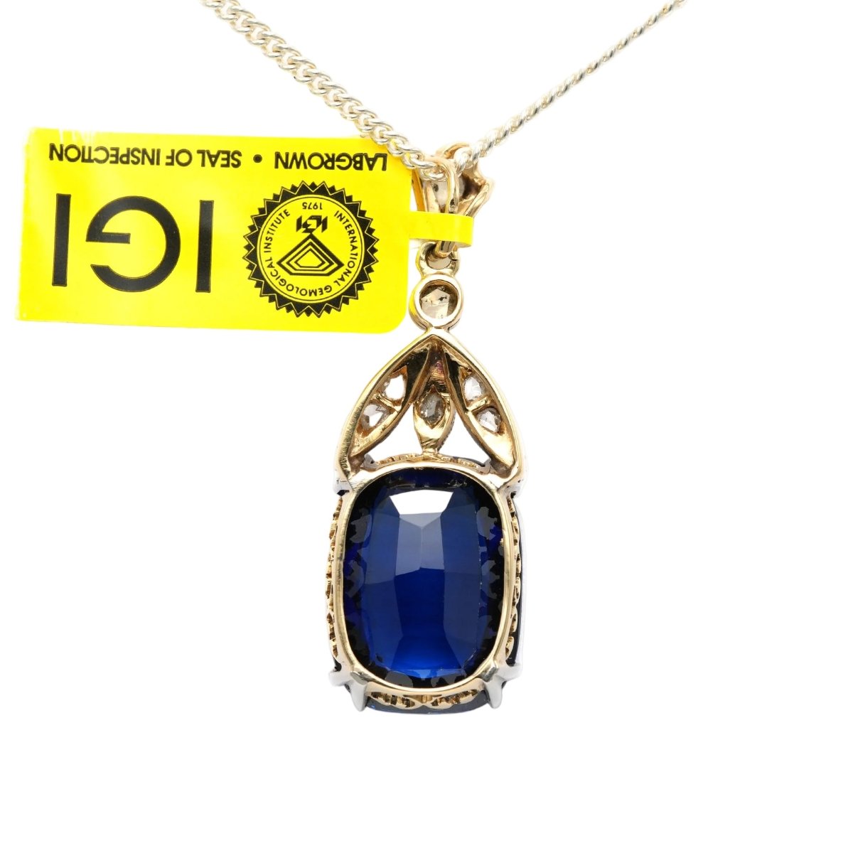 Pendentif en or blanc, or jaune, saphir et diamants - Castafiore