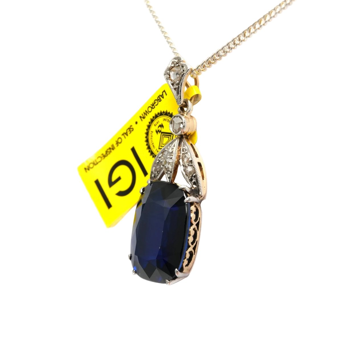 Pendentif en or blanc, or jaune, saphir et diamants - Castafiore