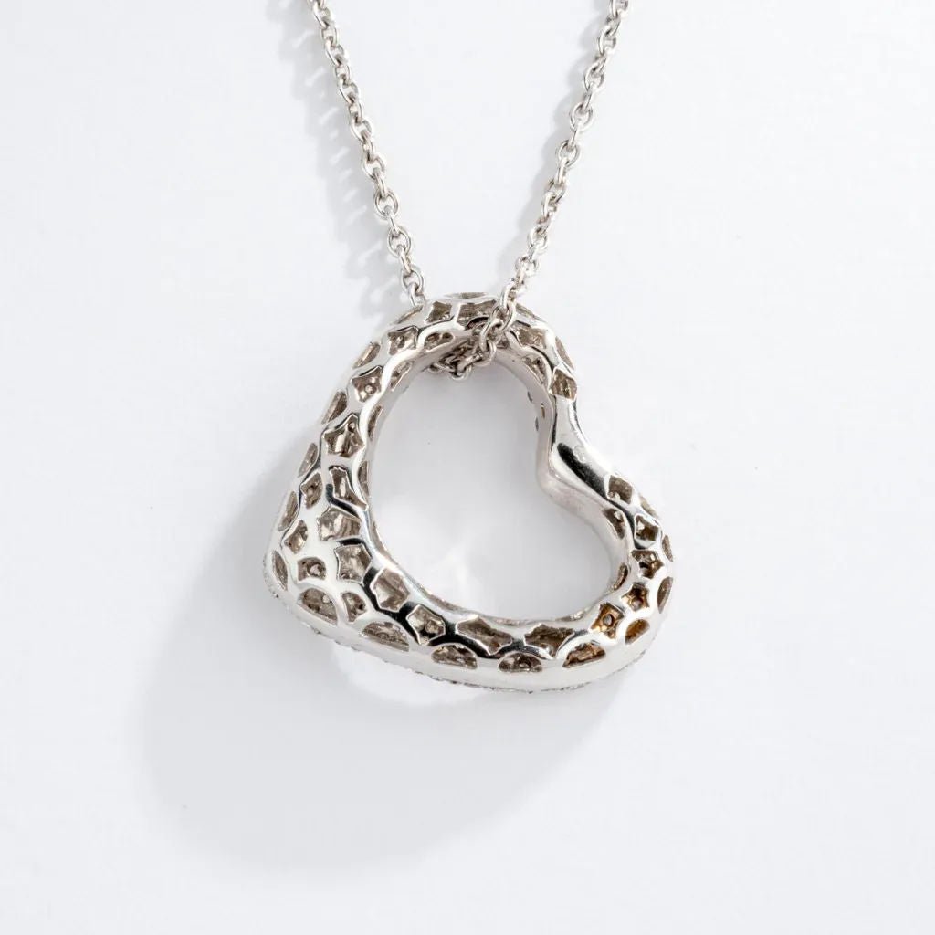 Pendentif en or gris formant un cœur pavée de diamants - Castafiore