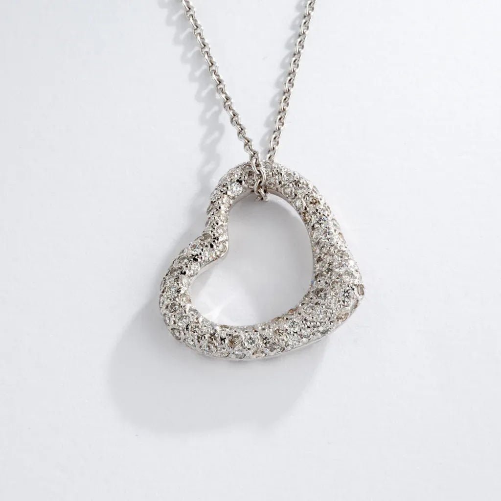 Pendentif en or gris formant un cœur pavée de diamants - Castafiore