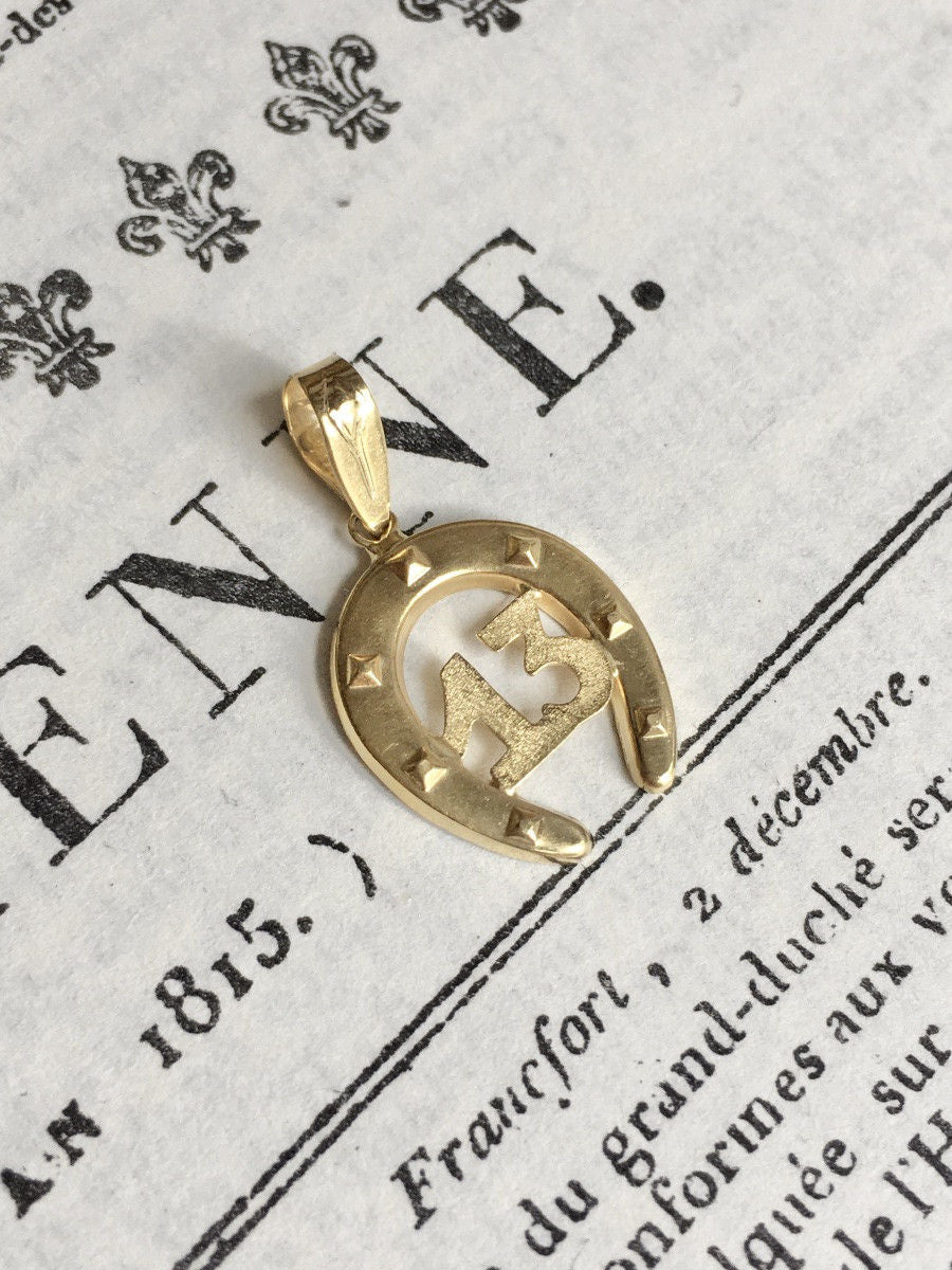 Pendentif en or jaune 18K en forme de fer à cheval - Castafiore