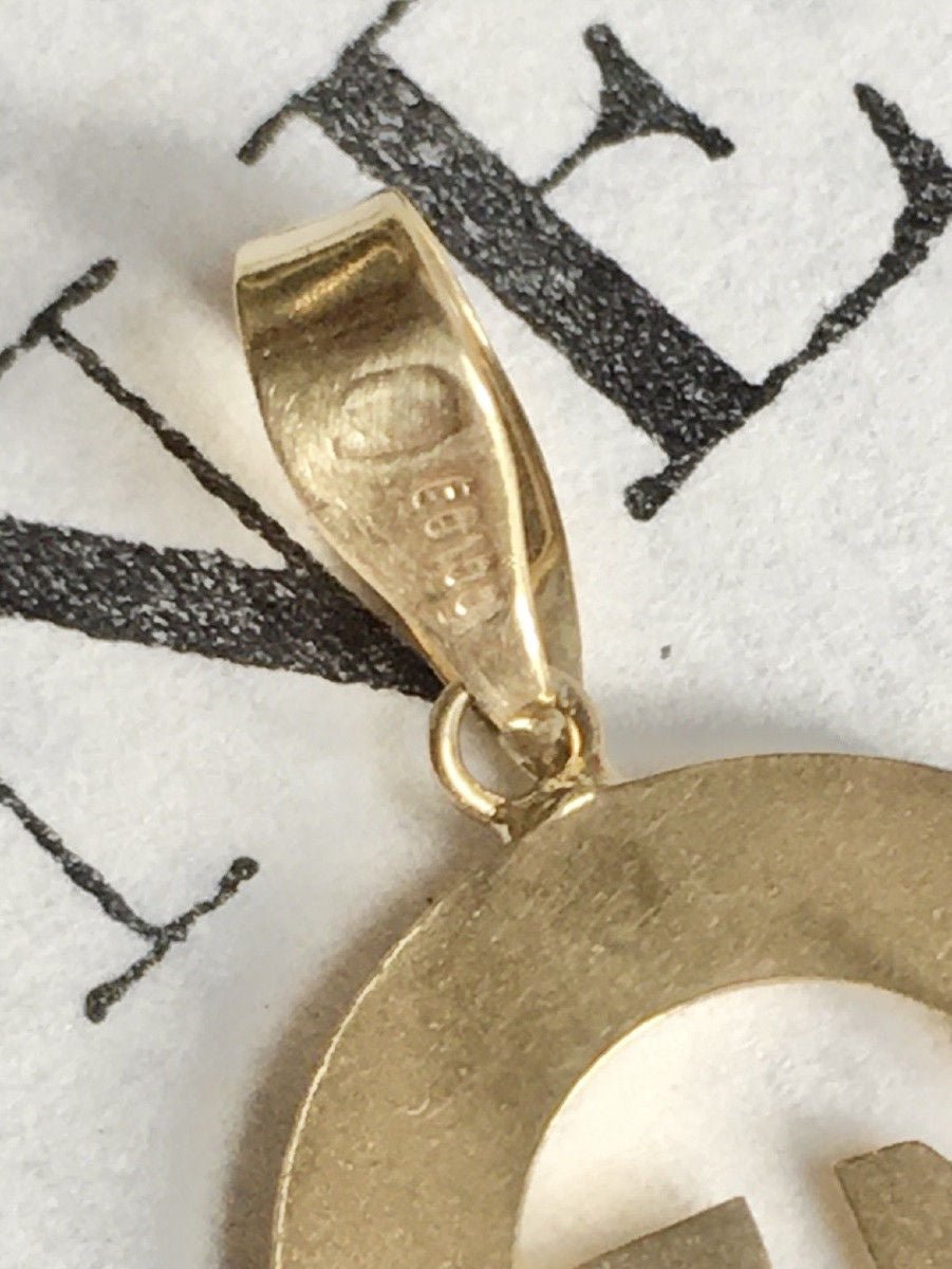 Pendentif en or jaune 18K en forme de fer à cheval - Castafiore