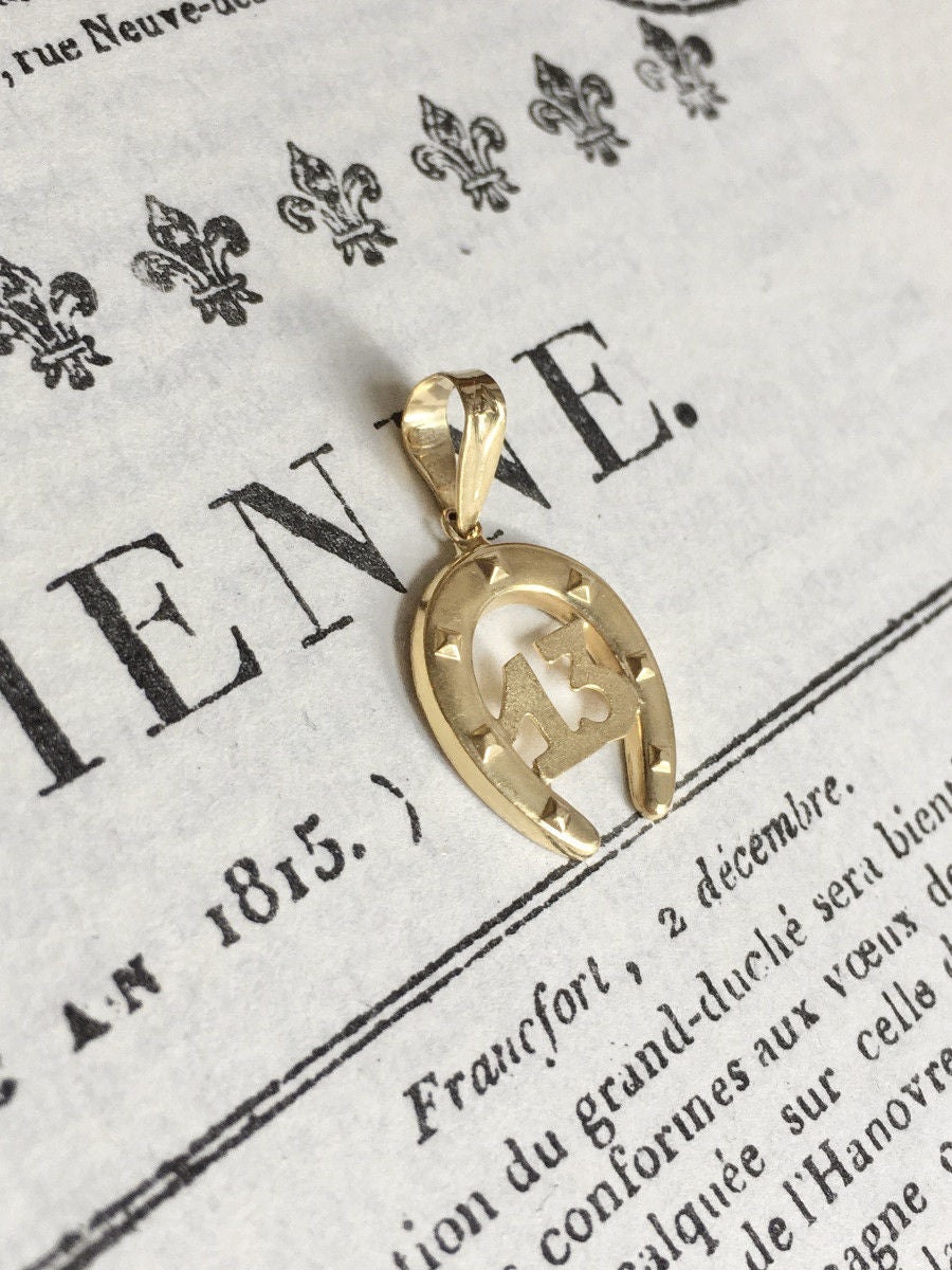 Pendentif en or jaune 18K en forme de fer à cheval - Castafiore