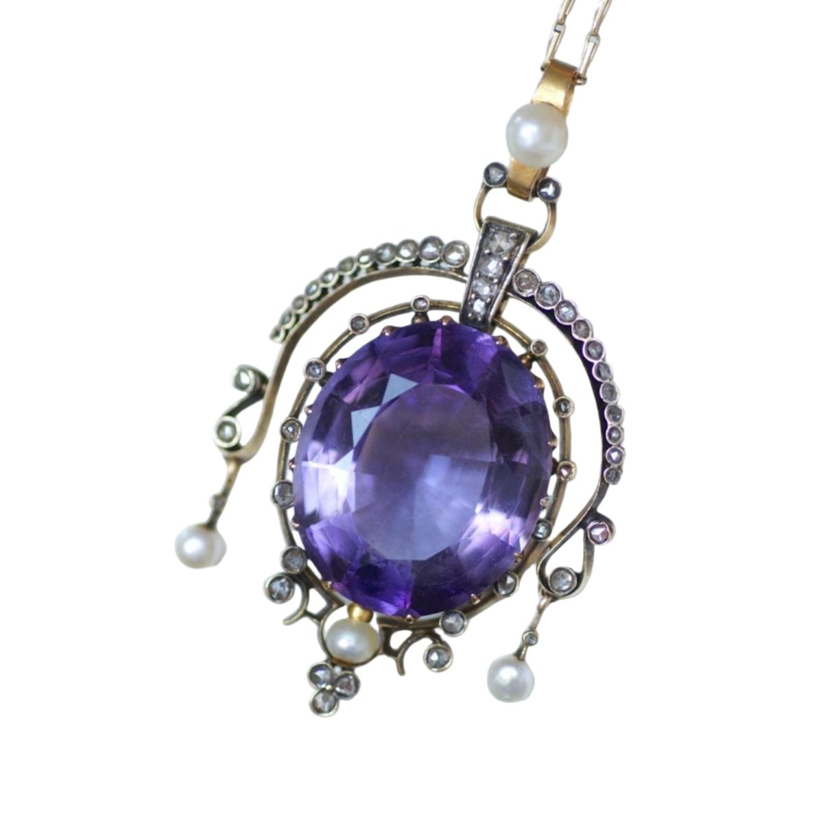 Pendentif en or jaune, argent, améthyste, perle, et diamants - Castafiore