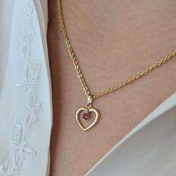 Pendentif en or jaune, rubis et diamants - Castafiore