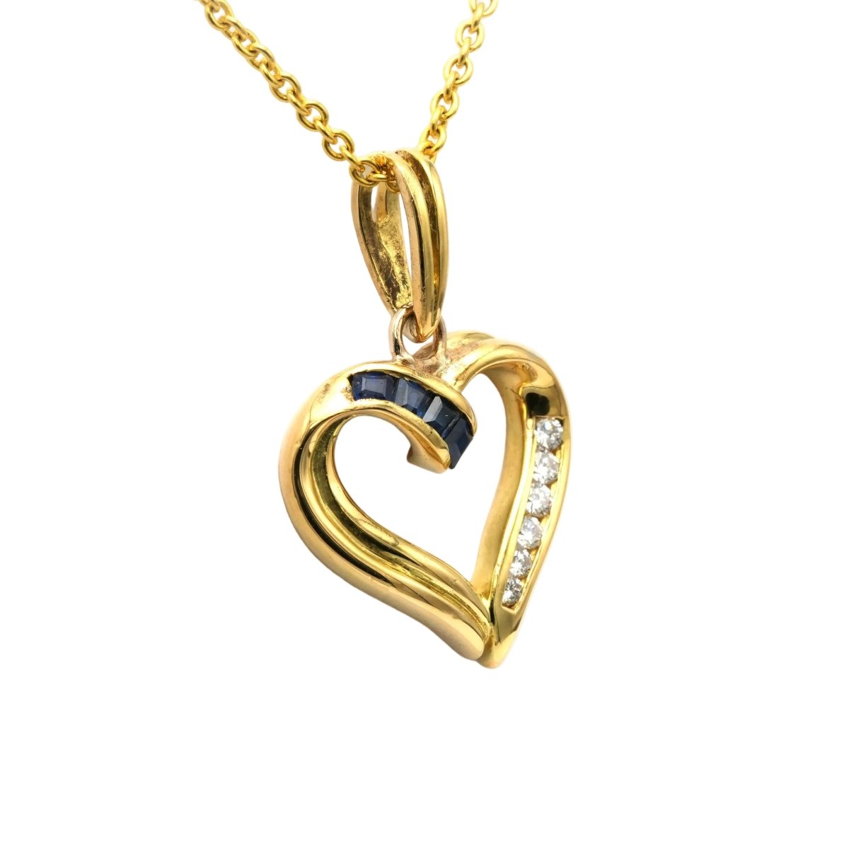 Pendentif en or jaune, saphirs et diamants - Castafiore