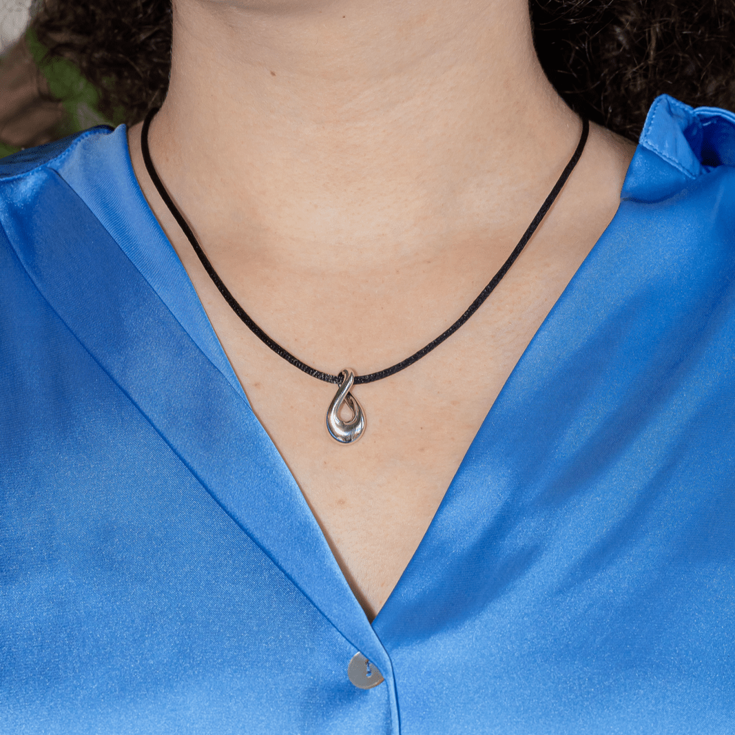 Pendentif FRED "Mouvementé" en or blanc - Castafiore