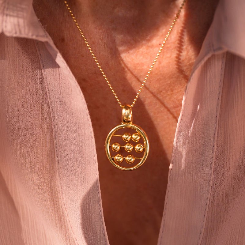 Pendentif HERMES by Georges Lenfant en or jaune - Castafiore