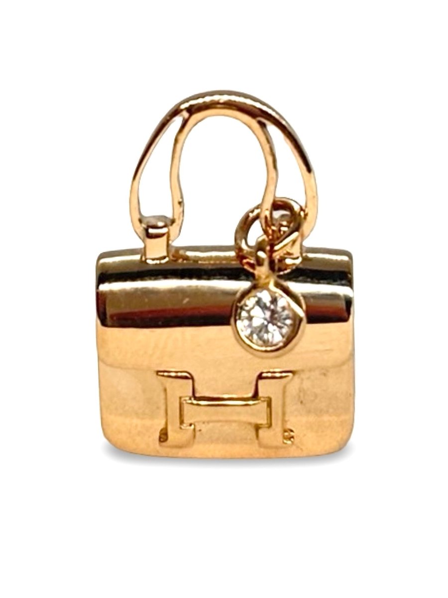 Pendentif HERMÈS Constance en or rose et diamant