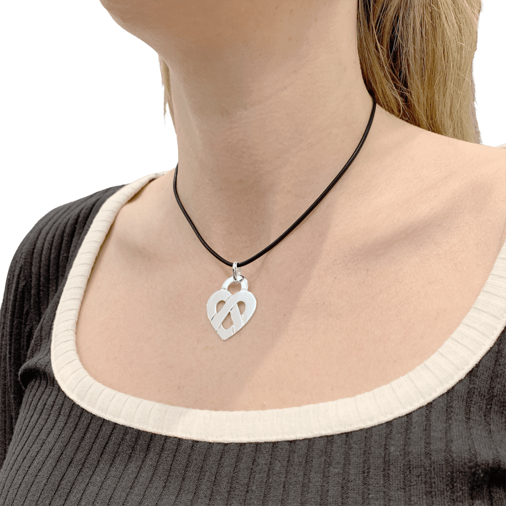 Pendentif POIRAY "Coeur Entrelacé" en or blanc - Castafiore