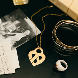 Pendentif POIRAY "Coeur Entrelacé" en or jaune - Castafiore