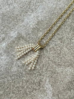 Pendentif pompon de perles de Cartier - Castafiore