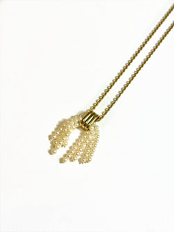 Pendentif pompon de perles de Cartier - Castafiore