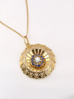 Pendentif rond vintage en or jaune, diamant et saphirs - Castafiore