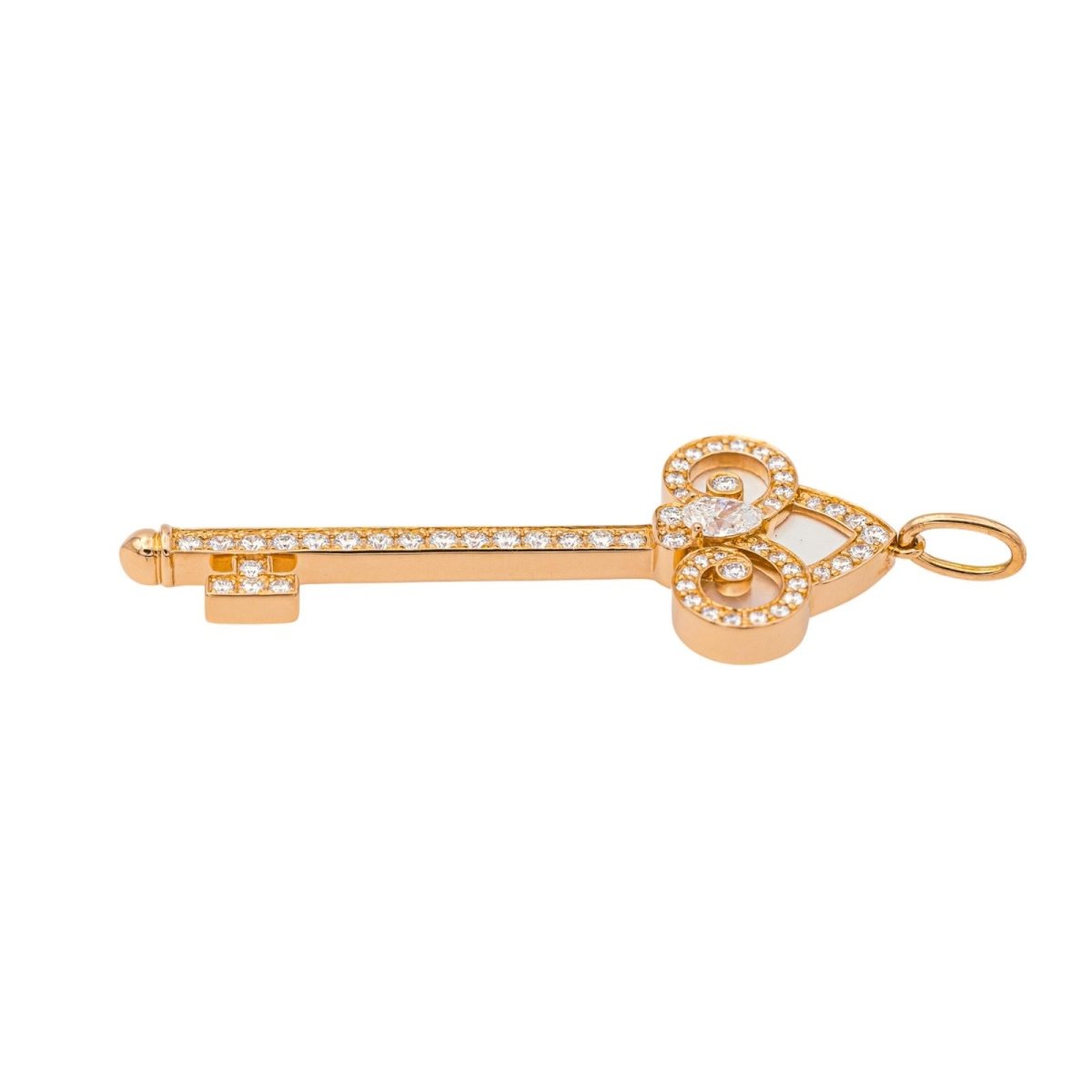 Pendentif TIFFANY & CO "Clé fleur de Lys" en or rose, nacre et diamants - Castafiore