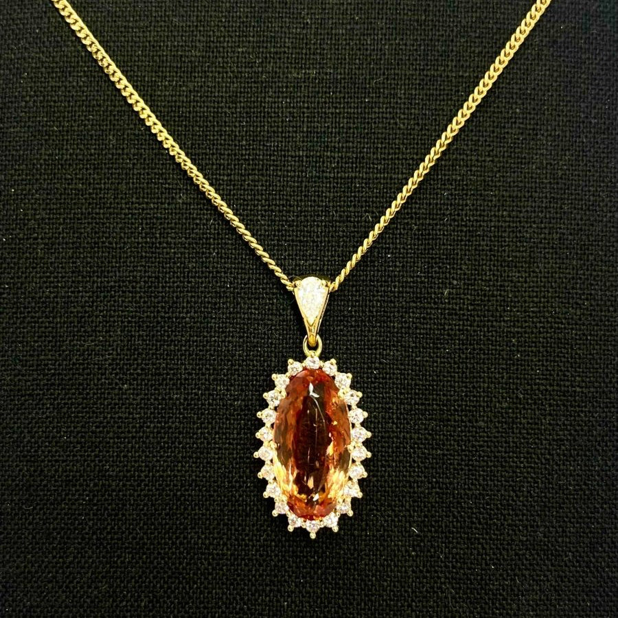 Pendentif Topaze impériale et diamants en or jaune - Castafiore