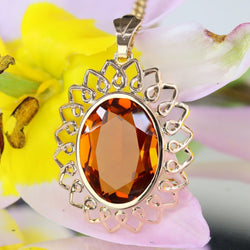 Pendentif vintage en or rose et verre orange - Castafiore