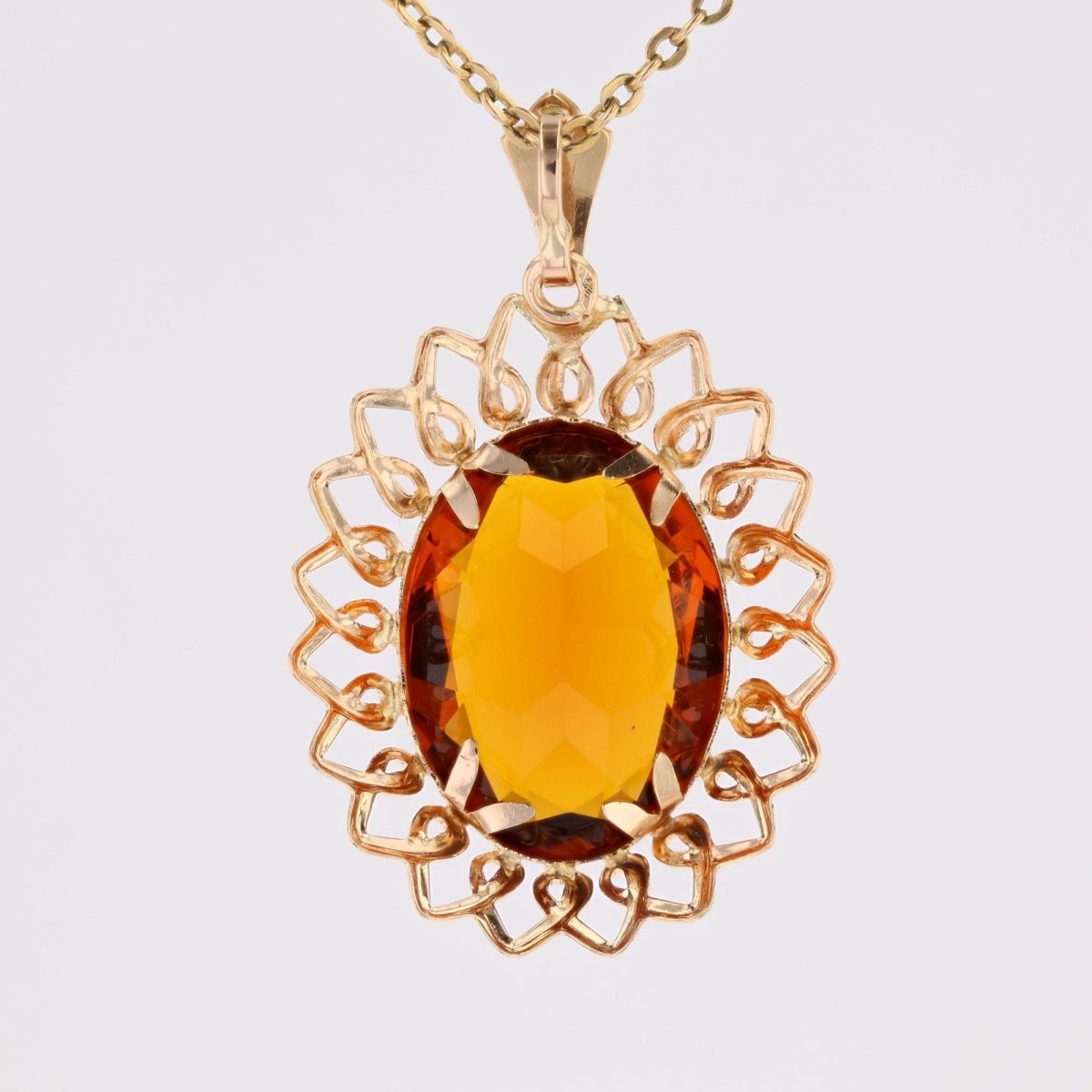 Pendentif vintage en or rose et verre orange - Castafiore